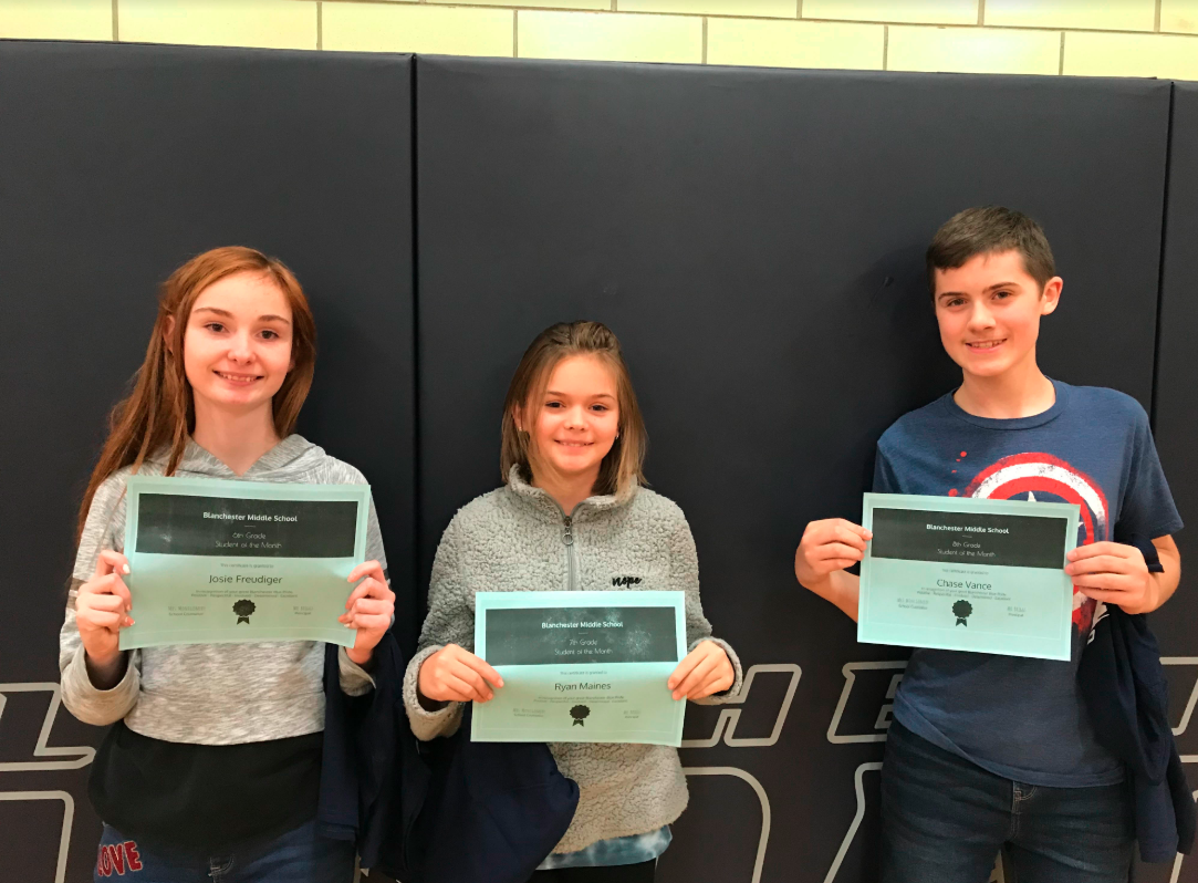 Josie, Ryan, and Chase holding certificates